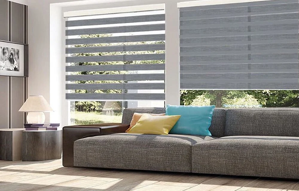 Zebra blinds filtering daylight into a contemporary interior